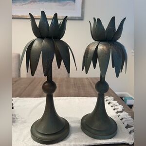 Vintage patina metal candlestick pair. Gorgeous! 14” high. Base is 5” wide.
